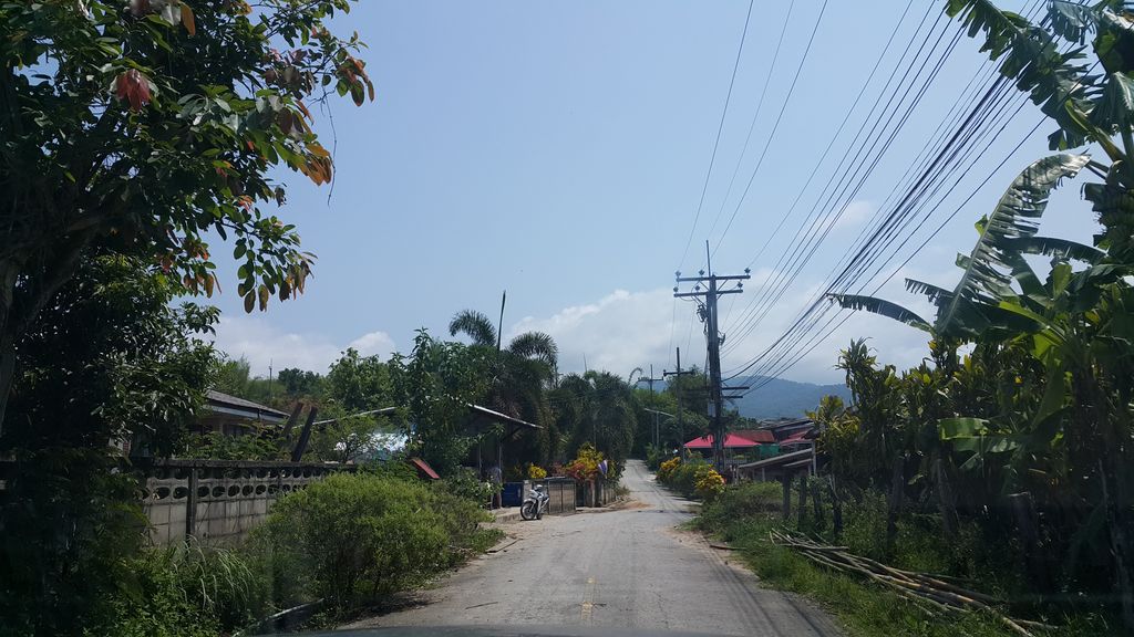 ภาพถนนตรงที่ บ้านทุ่งหลวง ต.แม่ยาว ตั้งอยู่ ถ่ายโดย jrcarlsen พ.ศ. 2560 (2017) · A street-level view of where บ้านทุ่งหลวง ต.แม่ยาว · Ban Thung Luang Ta.mae Yao stands, by jrcarlsen in 2560 (2017)